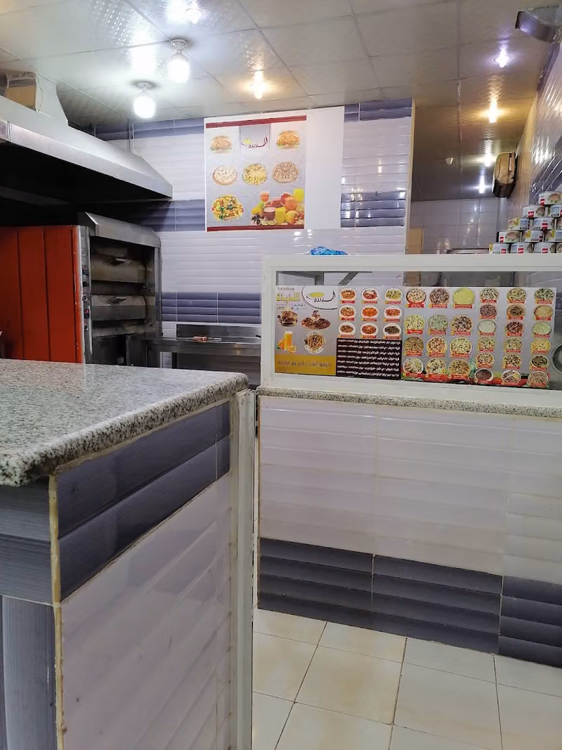 البيتزا اللذيذه