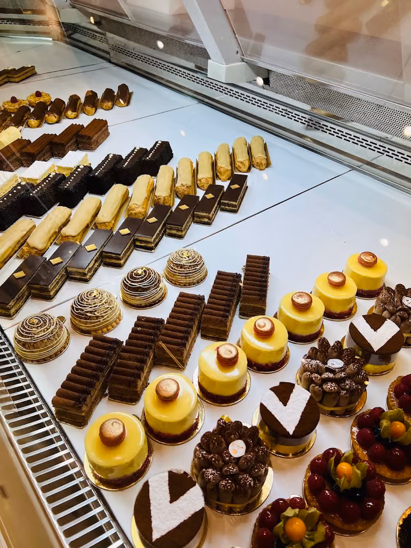 Le Gourmet الذواق