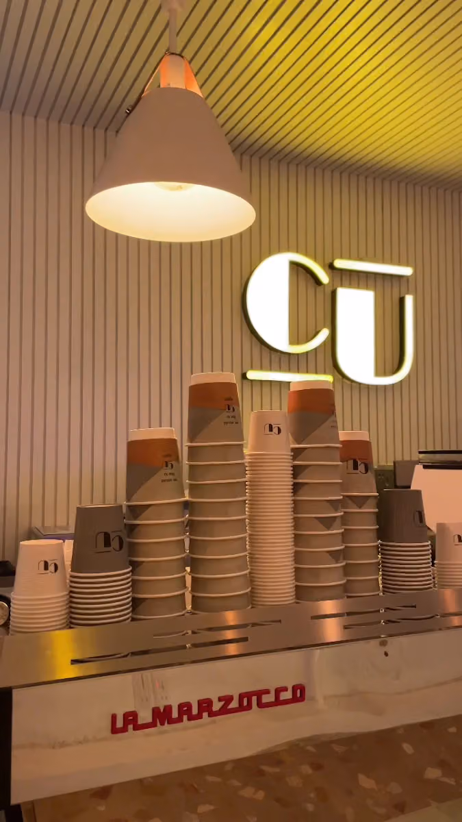 Cu