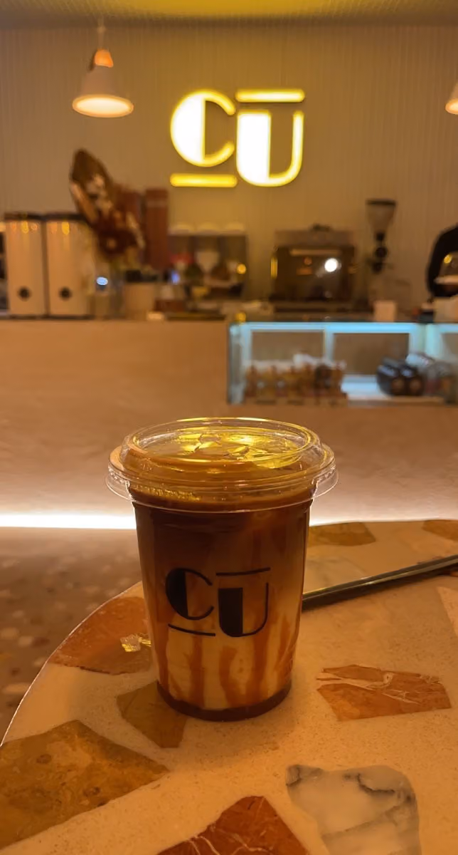 Cu