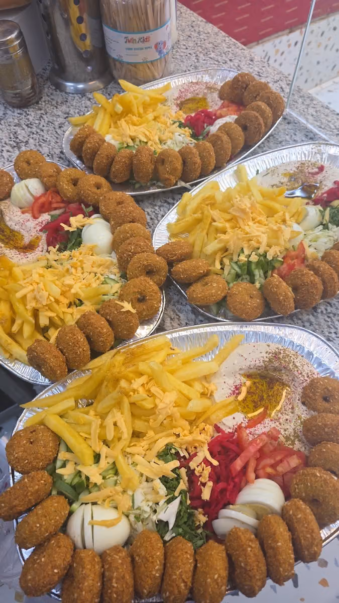 فلافل وشعبيات مشتاق شارع وادي بيشه