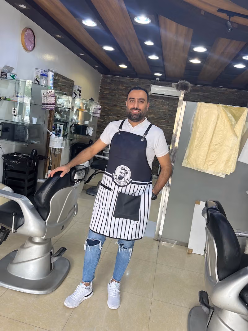 حلاق لمسات كرم