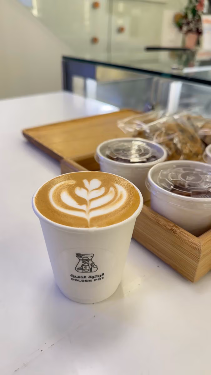 محمصة ومقهى الركوة الذهبية Golden Pot Cafe & Roastery