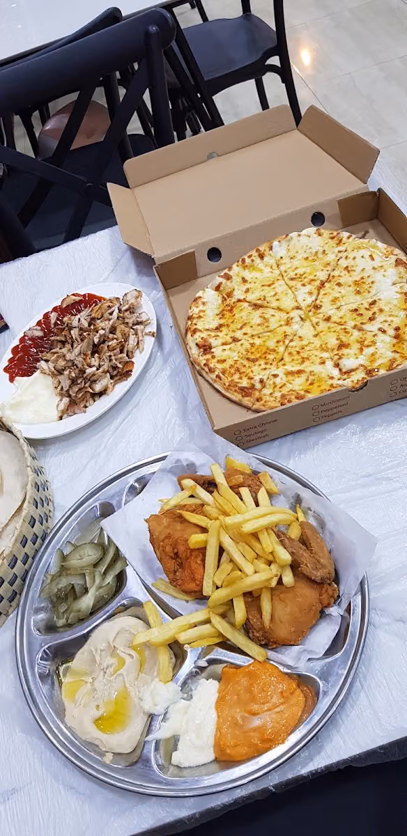 مطعم الاسطول المتميز 2 - شارع ابن الهيثم Alostool 2 Restaurant - Ibn Haitham St
