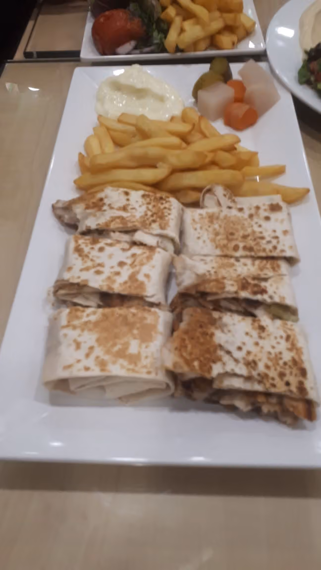 مطعم الذواق