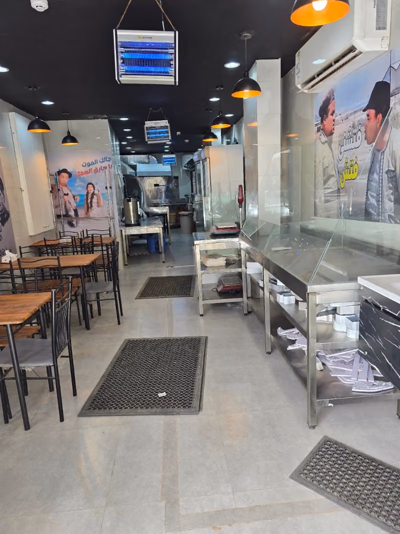 مطعم بيت الإستكوزا للمأكولات البحرية