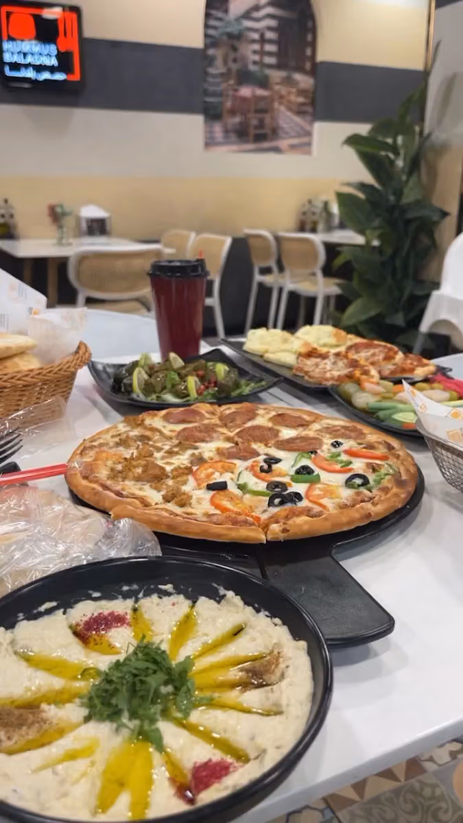 مطعم حمص بلدنا الرياض ( حي الروضة )
