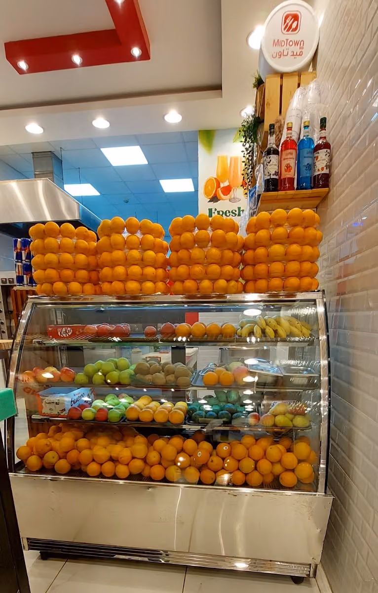 مطعم ميد تاون الرمال Midtown Restaurant