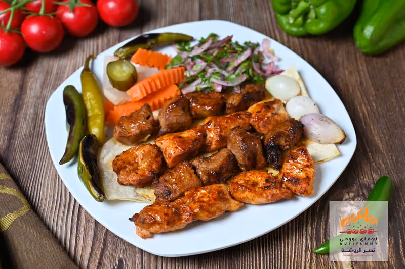 مطعم نهر الروشة ( نيوفاي يوومي Nufiy Yummy ) Nahar alrawsha Restaurant