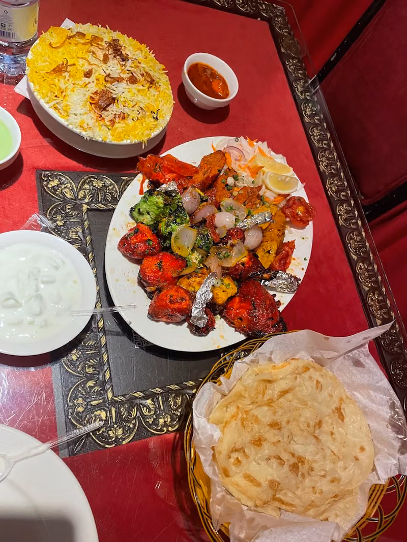 مطعم سبايسي هوم الهندي