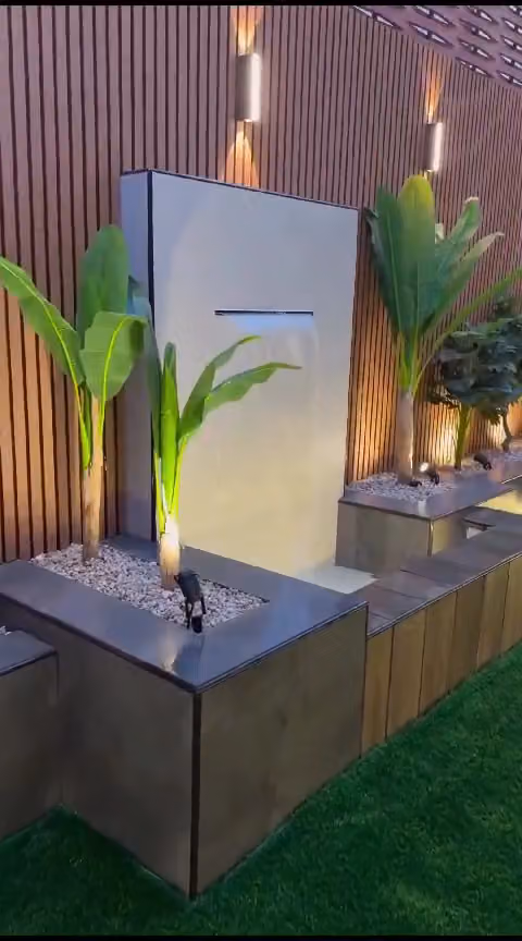مظله و شلال و حديقه
