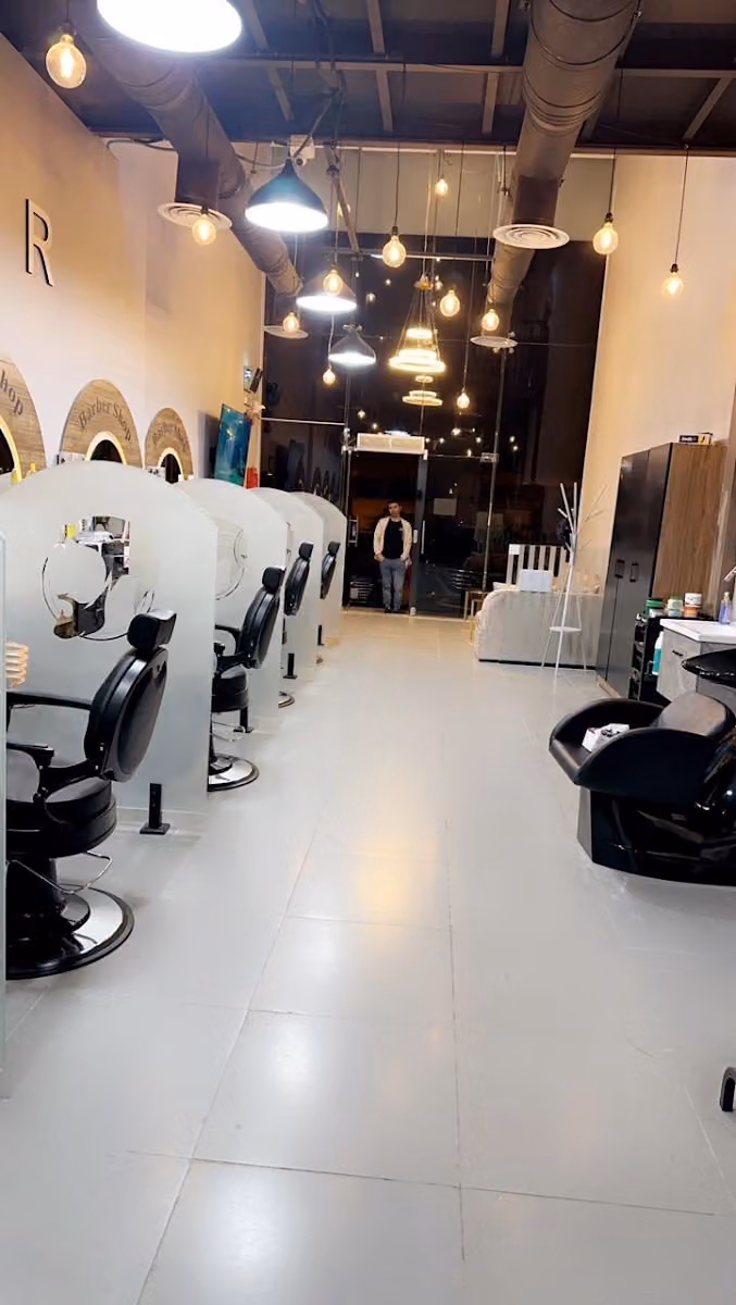 صالون عنوان اللمسة للحلاقة الرجالية BARBER
