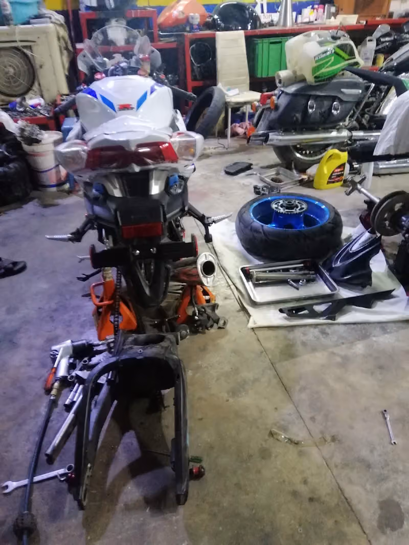 Aslam Motorcycle Maintenance Workshop